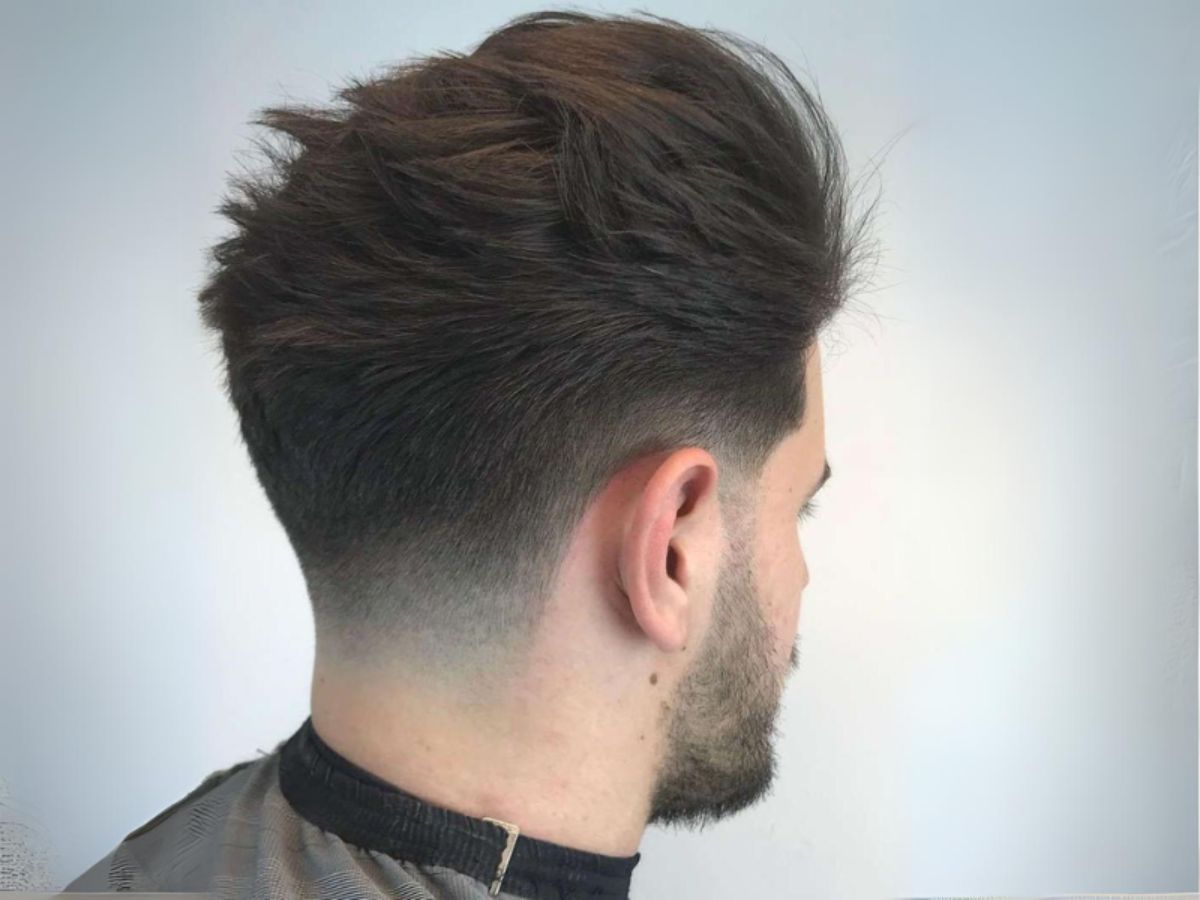 Thay vì cắt ngắn thông thường, kỹ thuật fade mang lại sự chuyển màu mượt mà từ dưới lên trên