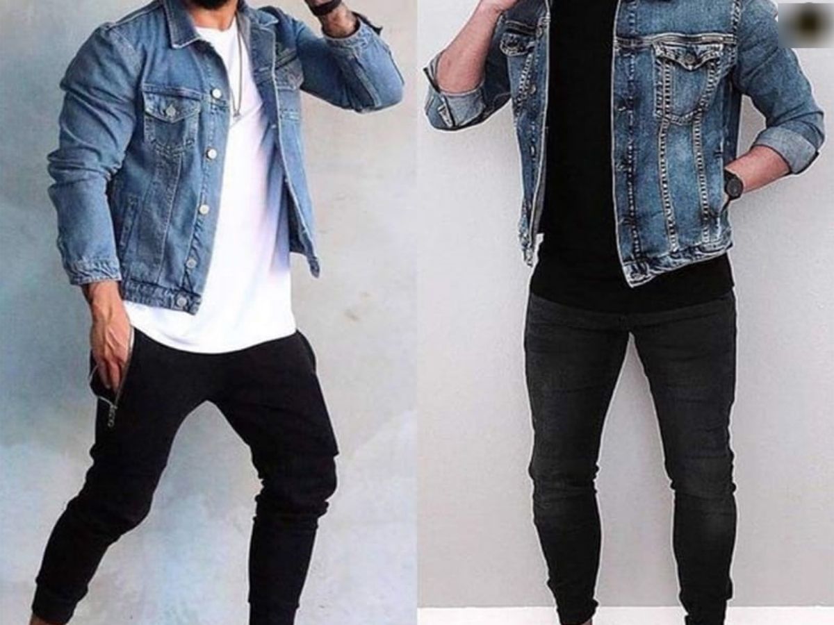 Người mẫu nam mặc áo khoác jeans khoác ngoài hoodie xám, phối cùng quần jogger đen