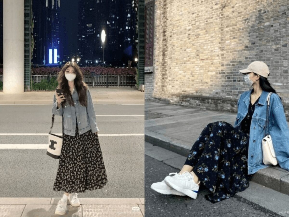 Cô gái mặc váy hoa nhí, khoác hờ áo jean form rộng